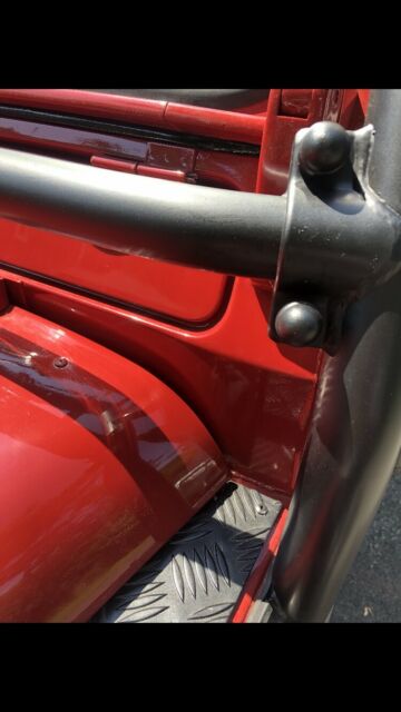 1991 Portofino Red Land Rover Defender