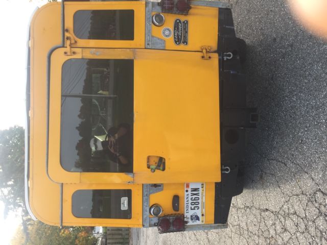 1964 Yellow Land Rover Defender Wagon