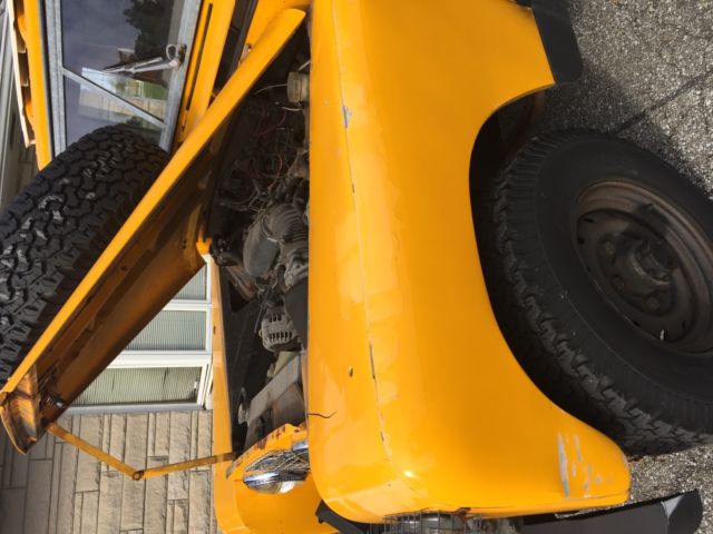 1964 Yellow Land Rover Defender Wagon