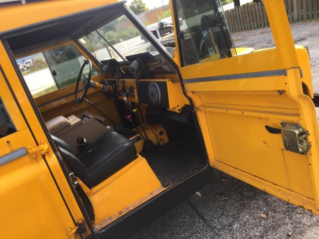 1964 Yellow Land Rover Defender Wagon