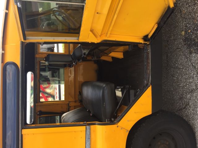 1964 Yellow Land Rover Defender Wagon