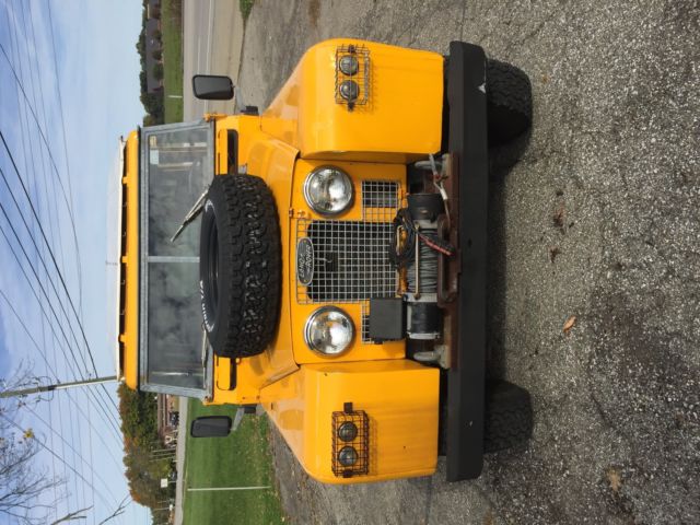 1964 Yellow Land Rover Defender Wagon