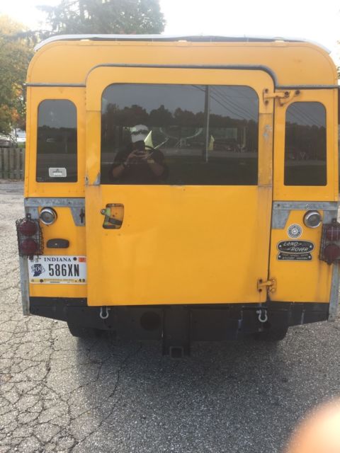 1964 Yellow Land Rover Defender Wagon