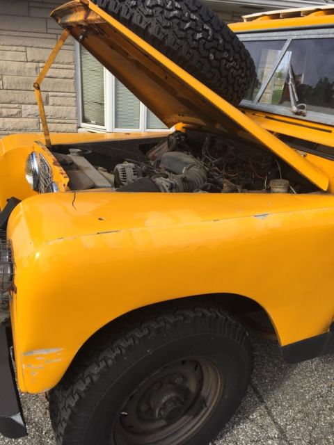 1964 Yellow Land Rover Defender Wagon