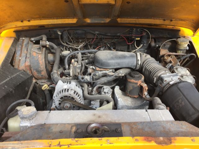 1964 Yellow Land Rover Defender Wagon