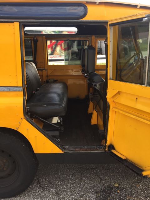 1964 Yellow Land Rover Defender Wagon