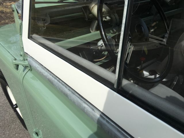 1965 Green/white Land Rover Defender Wagon