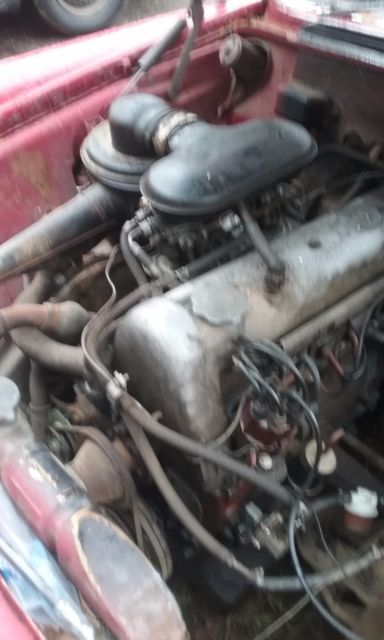 1961 Red Mercedes-Benz 200-Series Sedan