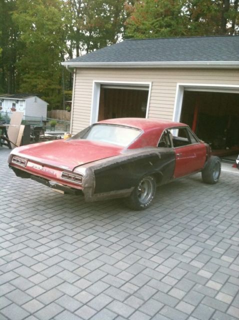 1967 Red Pontiac Le Mans