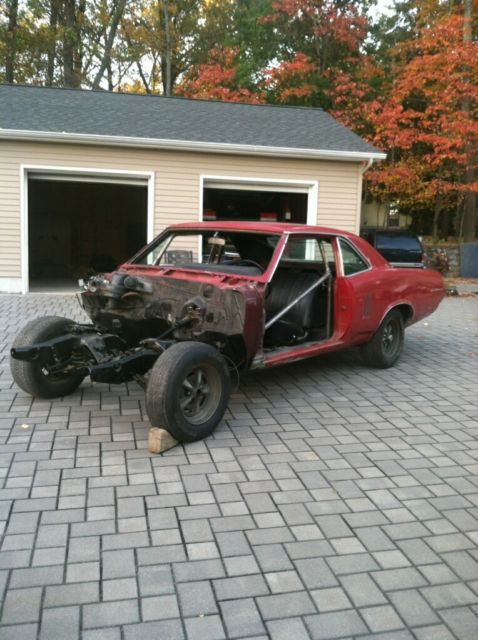 1967 Red Pontiac Le Mans