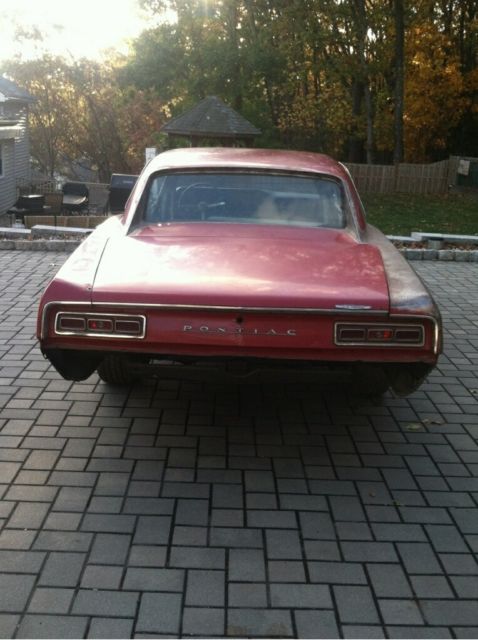 1967 Red Pontiac Le Mans