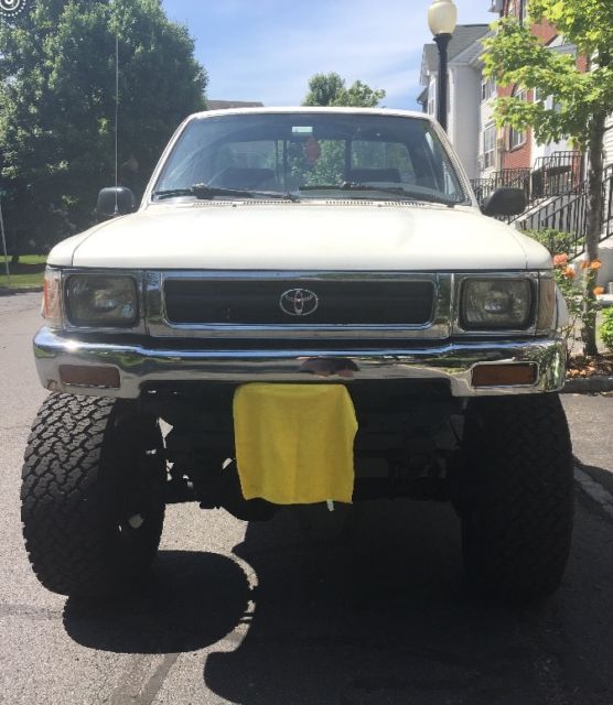 1992 white Toyota Tacoma pickup