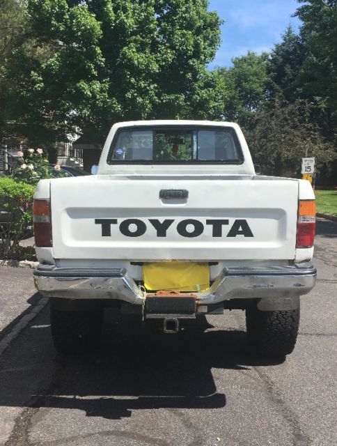 1992 white Toyota Tacoma pickup