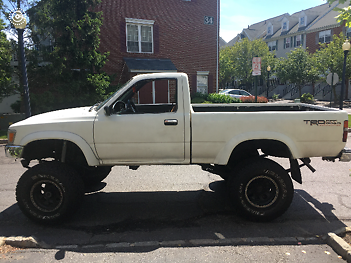 1992 white Toyota Tacoma pickup