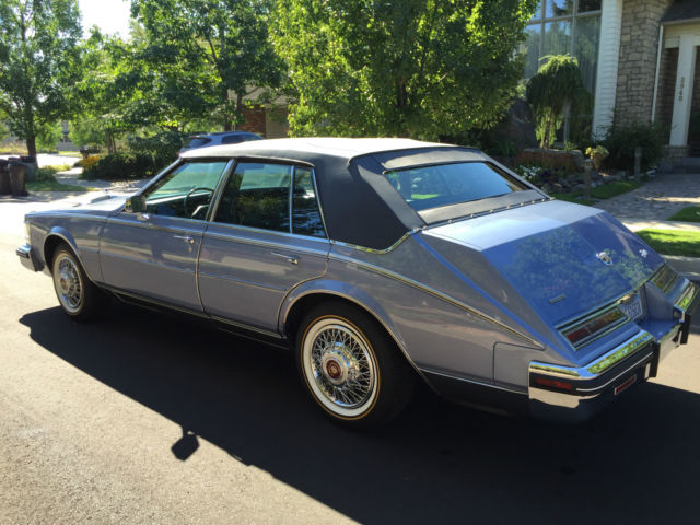 1984 Blue Cadillac Seville Sedan
