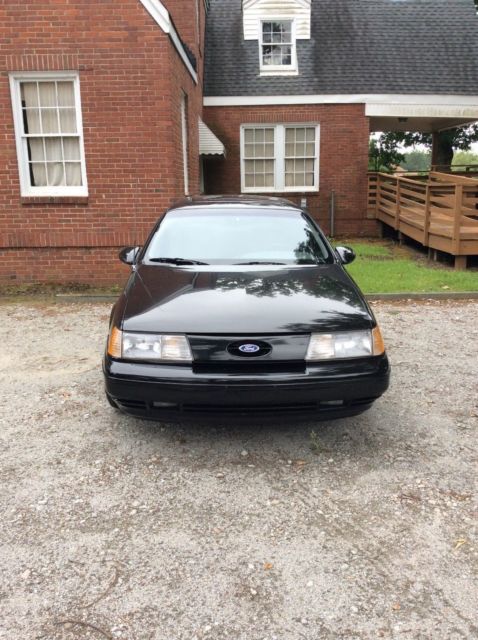 1989 Black Ford Taurus Sedan