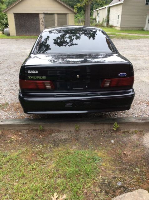 1989 Black Ford Taurus Sedan