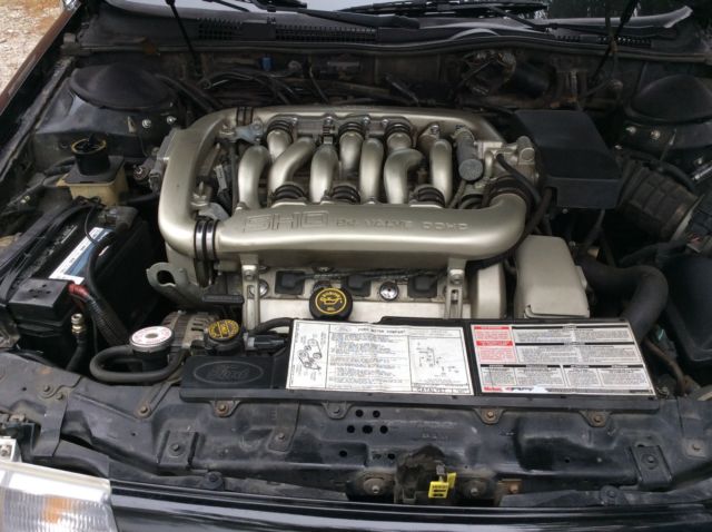 1989 Black Ford Taurus Sedan