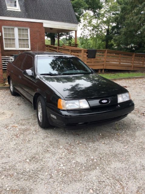 1989 Black Ford Taurus Sedan
