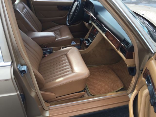 1985 Gold Mercedes-Benz 500-Series