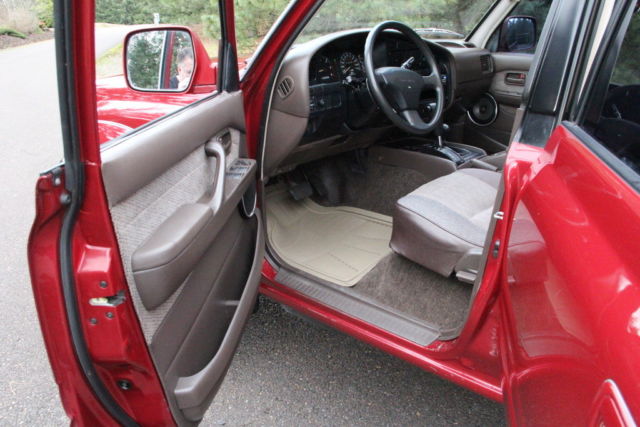 1992 Maroon Toyota Land Cruiser SUV
