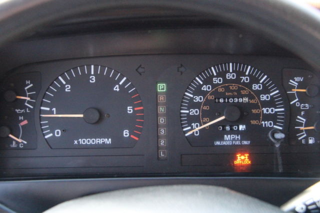 1992 Maroon Toyota Land Cruiser SUV