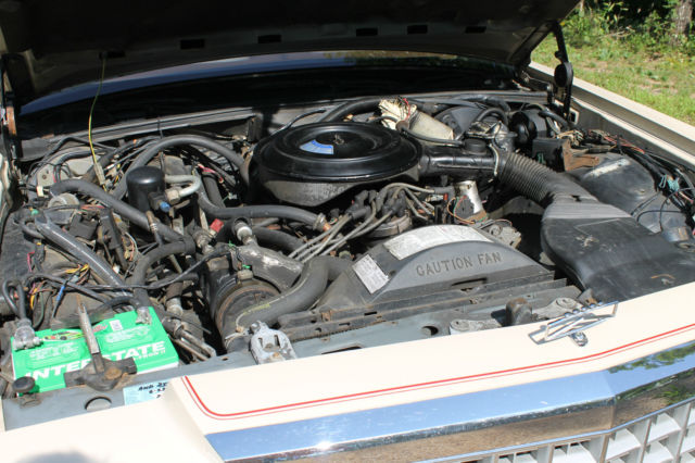 1985 Tan Ford Crown Victoria Four Door Sedan