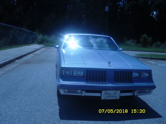 1984 Blue Oldsmobile Cutlass Coupe