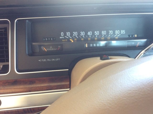 1990 Tan Ford Crown Victoria Sedan