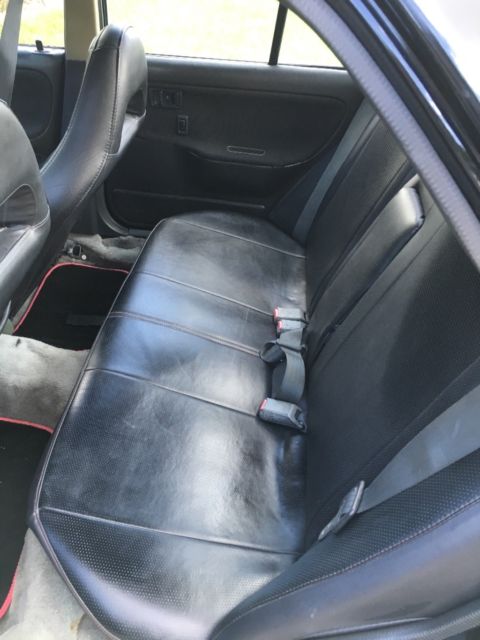 1993 Black Mazda Protege Sedan