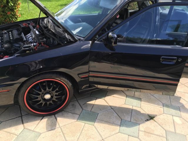 1993 Black Mazda Protege Sedan