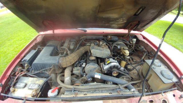 1990 Red Ford Ranger Standard Cab Pickup