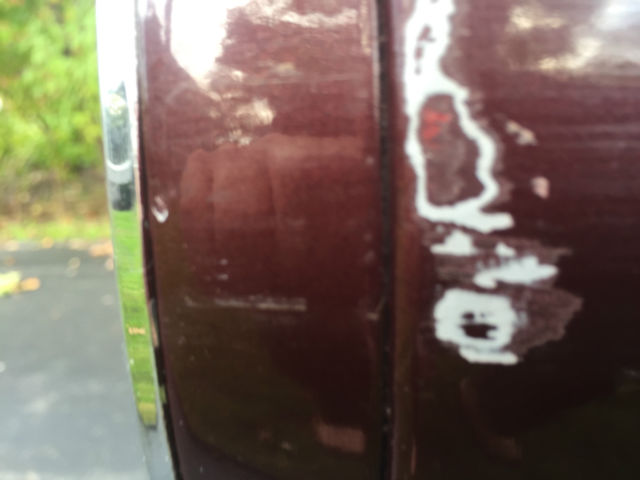 1964 Maroon Cadillac DeVille Convertible