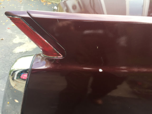 1964 Maroon Cadillac DeVille Convertible