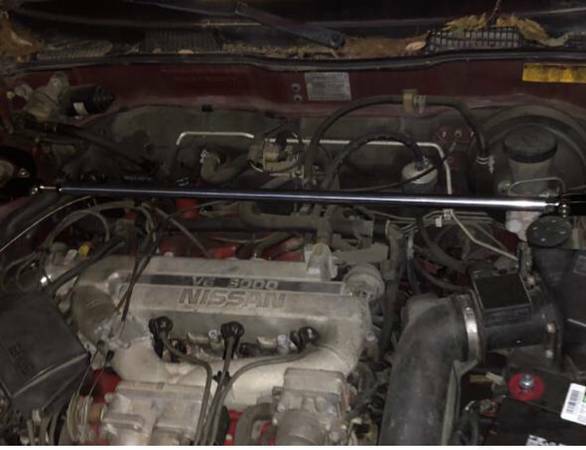 1994 Red Nissan Maxima Sedan