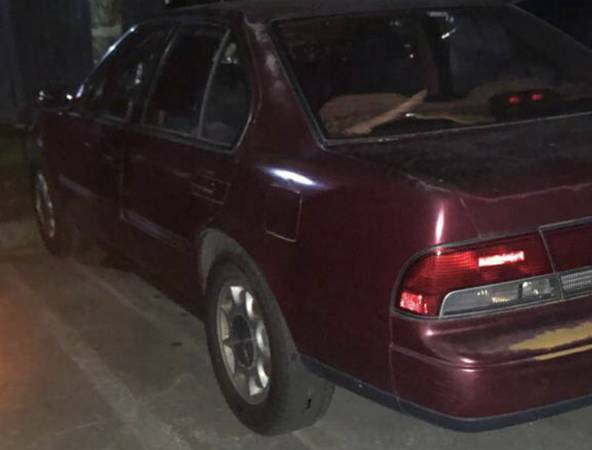 1994 Red Nissan Maxima Sedan