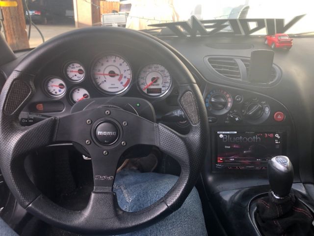 1955 Silver Stone Metallic Mazda RX-7 Coupe