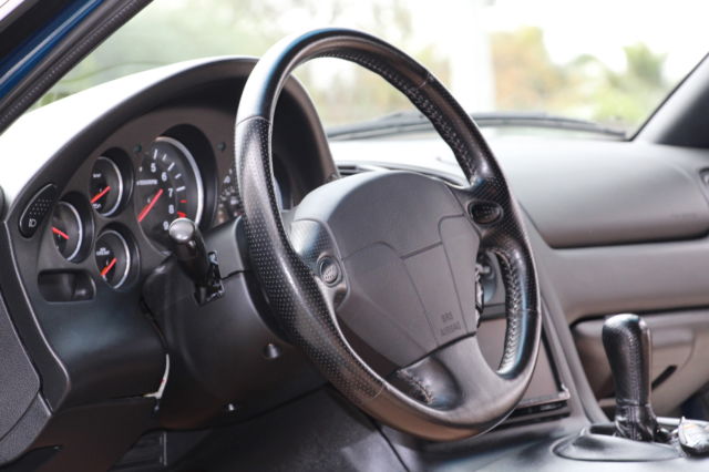 1994 blue Mazda RX-7 Coupe