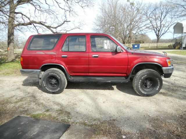 1994 maroon Toyota 4Runner SUV