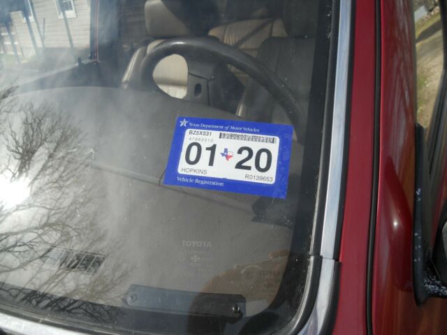 1994 maroon Toyota 4Runner SUV