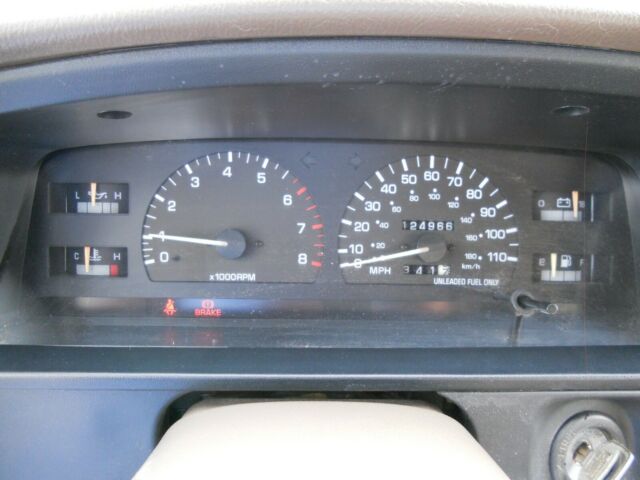 1994 maroon Toyota 4Runner SUV