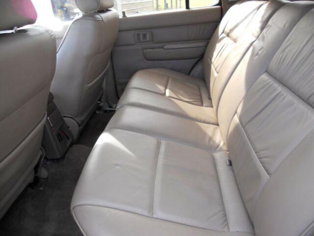 1994 maroon Toyota 4Runner SUV