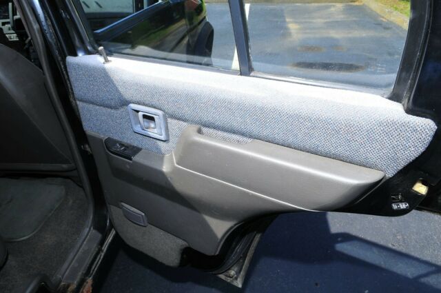 1990 Black Nissan Pathfinder SUV