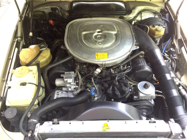 1987 champagne Mercedes-Benz SL-Class Convertible