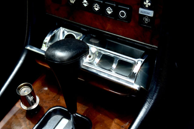 1987 champagne Mercedes-Benz SL-Class Convertible