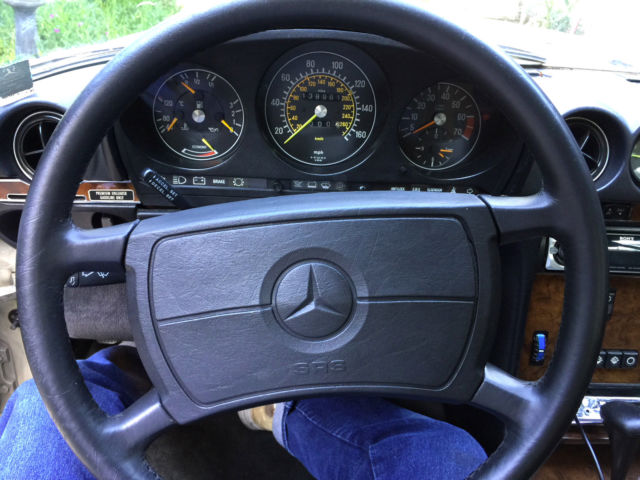 1987 champagne Mercedes-Benz SL-Class Convertible