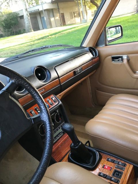 1983 Burgundy Mercedes-Benz 200-Series Sedan