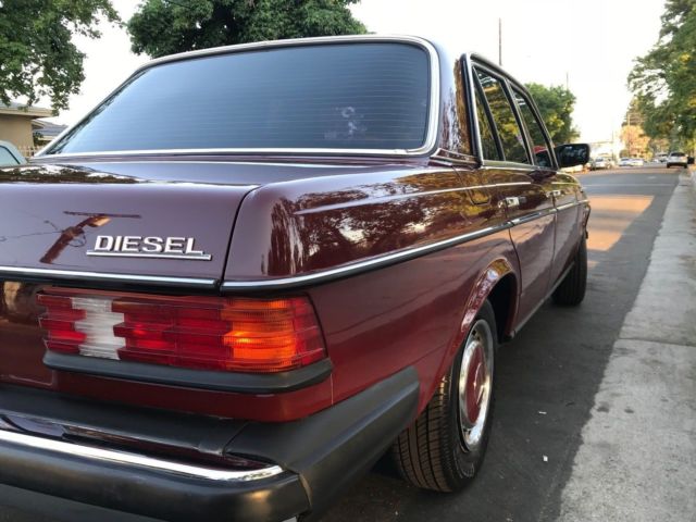 1983 Burgundy Mercedes-Benz 200-Series Sedan
