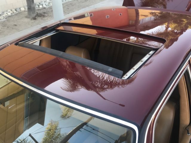 1983 Burgundy Mercedes-Benz 200-Series Sedan