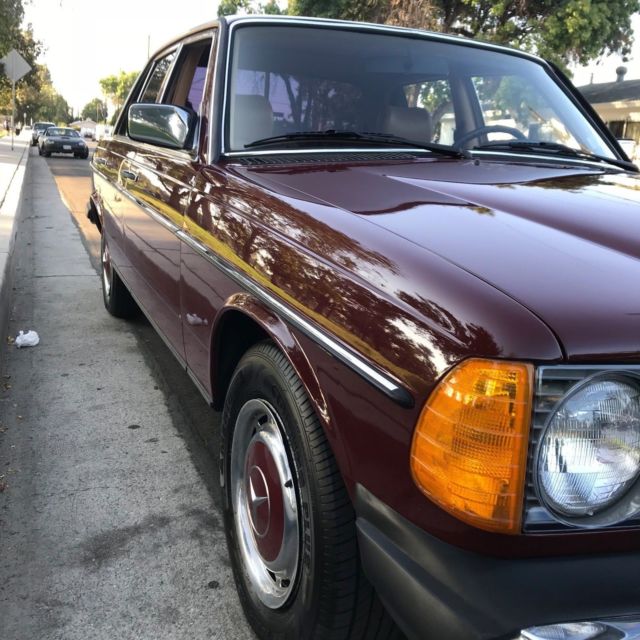 1983 Burgundy Mercedes-Benz 200-Series Sedan